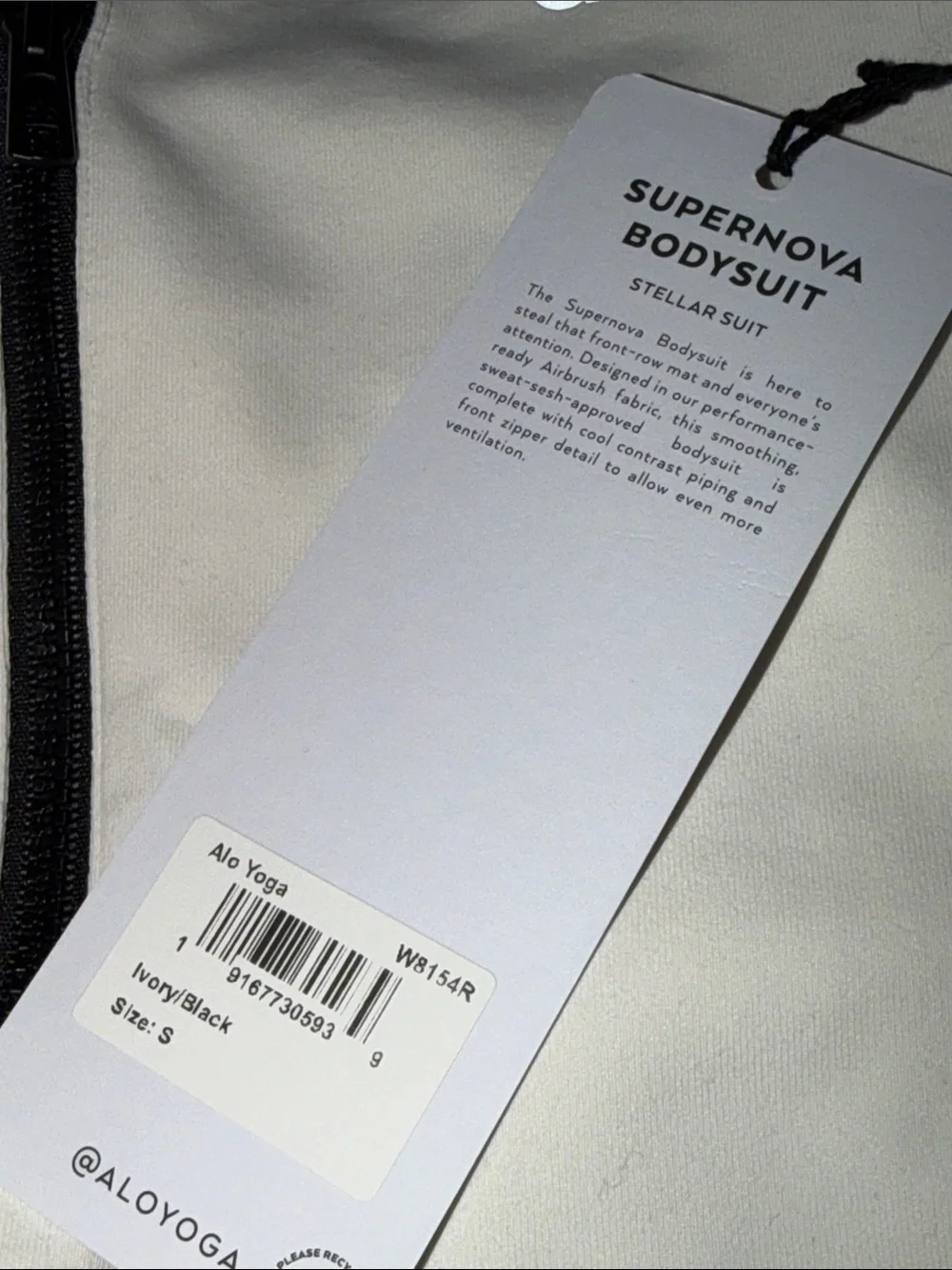 NWT ALO Yoga Supernova Bodysuit - Ivory/Black size Small